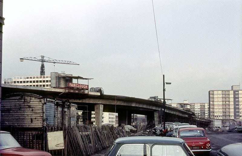 The Elevated Section Of The Mancunian Way Under Construction In 1966  The Tower Of Umists Faraday Building Also Under Construction Can Be Seen Rising Beyond The Flyover On The Left Of The Picture